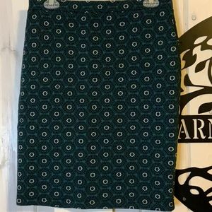 Leota pull on skirt in teal with black and white pattern. Size M